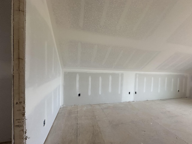 bonus room featuring lofted ceiling