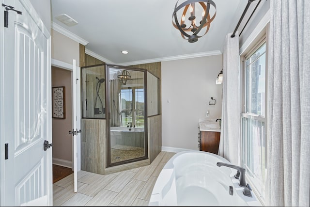 bathroom featuring plus walk in shower, vanity, and crown molding