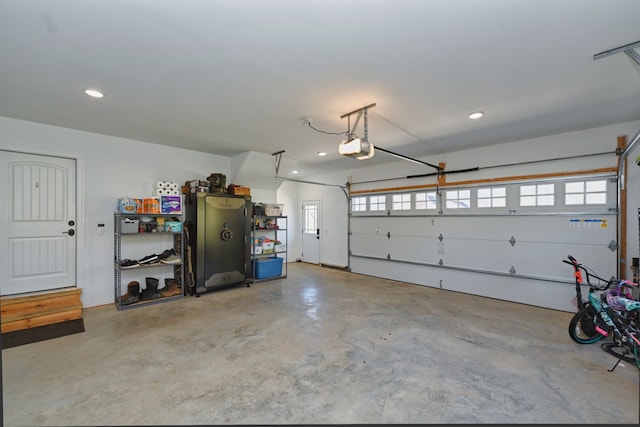 garage featuring a garage door opener