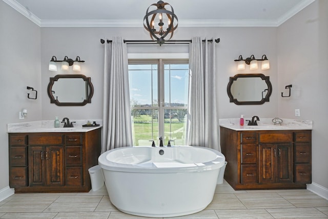 2189 Double Branch Rd, Columbia, TN 38401 - full bath with a freestanding tub, two vanities, ornamental molding, and baseboards