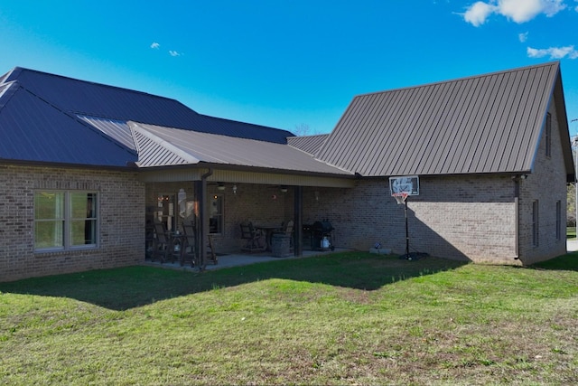 2189 Double Branch Rd, Columbia, TN 38401 - rear view of property with brick siding, a yard, and a patio area