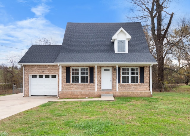 new england style home with a front lawn and a garage