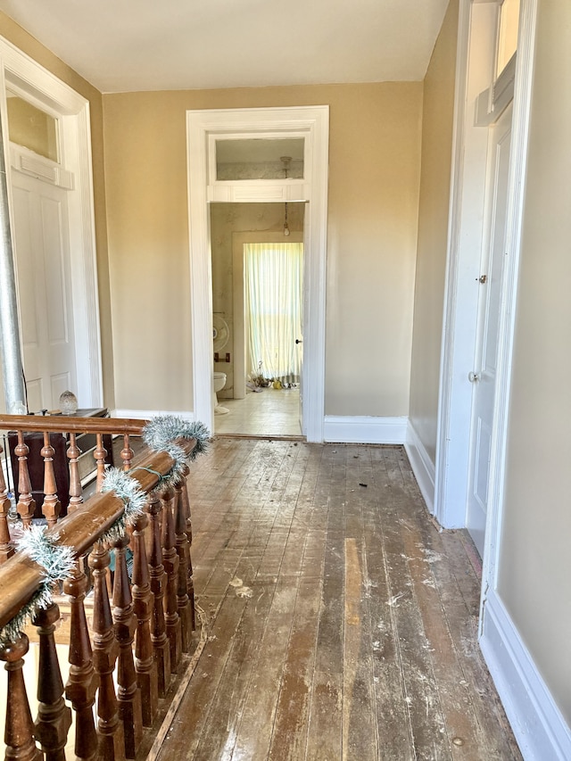 corridor featuring dark hardwood / wood-style flooring