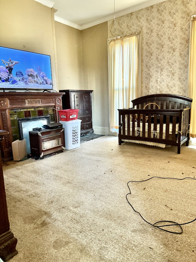 carpeted bedroom featuring a crib and ornamental molding