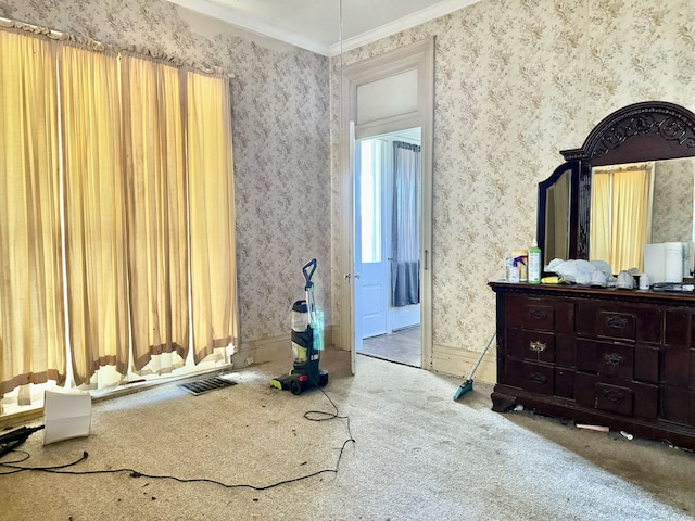 bedroom featuring carpet floors and ornamental molding