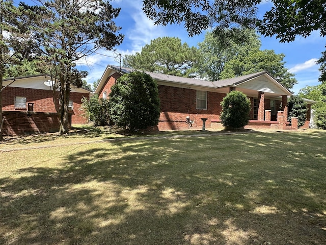 exterior space featuring a porch and a front lawn