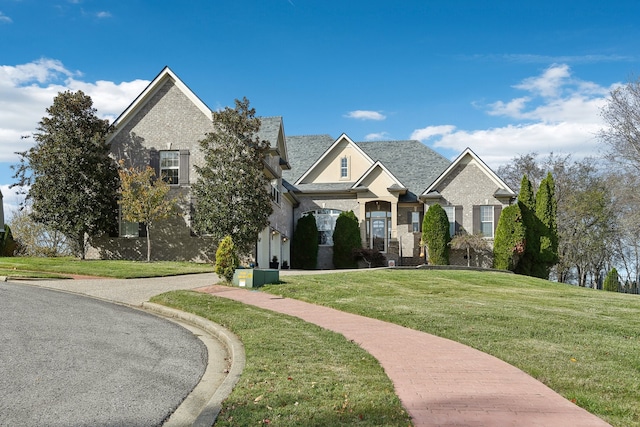 view of front facade with a front lawn