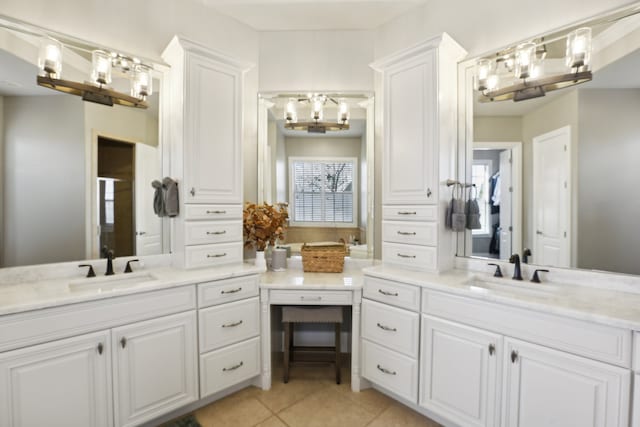 bathroom featuring tile patterned floors and vanity