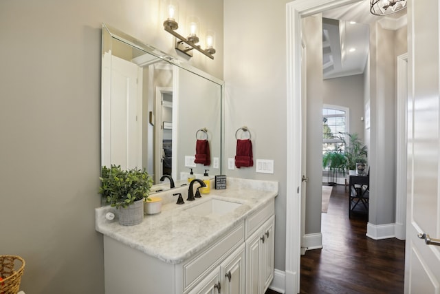 bathroom featuring hardwood / wood-style floors and vanity