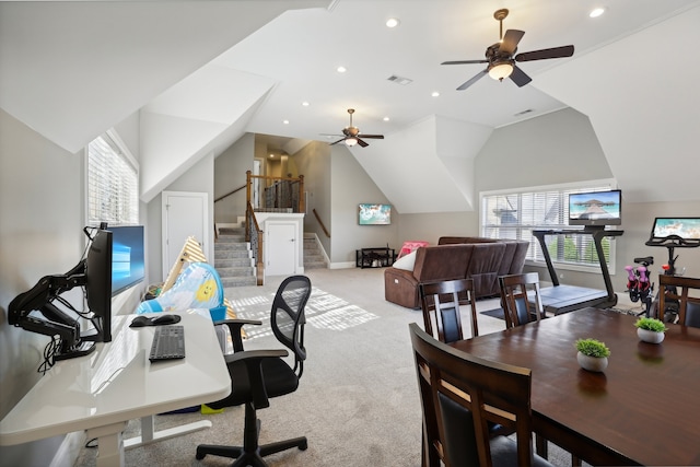 office area with light carpet, ceiling fan, and lofted ceiling