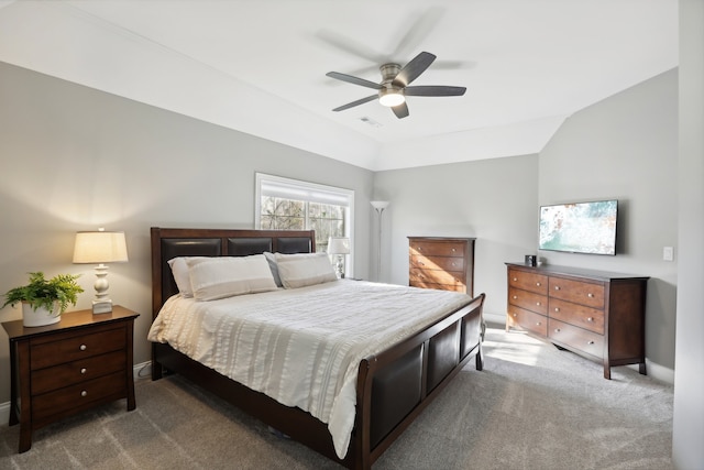 bedroom featuring carpet, ceiling fan, and vaulted ceiling