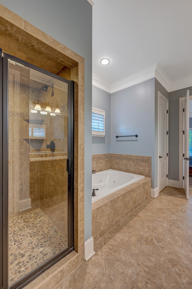 bathroom with shower with separate bathtub and ornamental molding