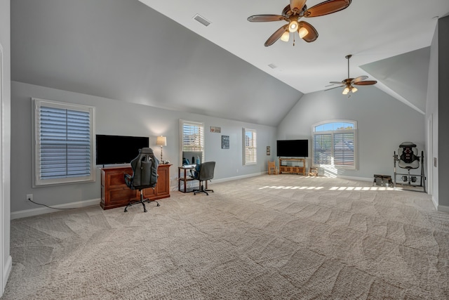 office area with ceiling fan, light carpet, and vaulted ceiling