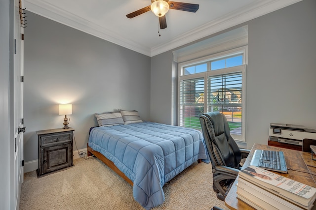 bedroom featuring ceiling fan, light colored carpet, and ornamental molding