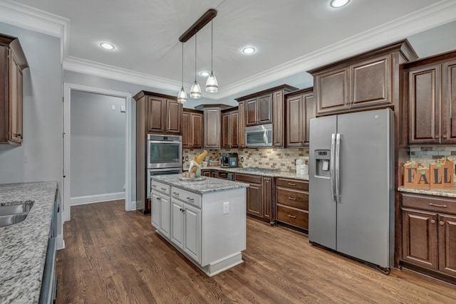 kitchen featuring light stone countertops, decorative backsplash, dark hardwood / wood-style flooring, dark brown cabinetry, and stainless steel appliances