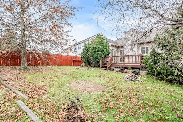 view of yard featuring a wooden deck