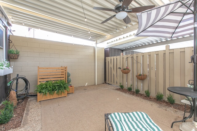 view of patio with ceiling fan