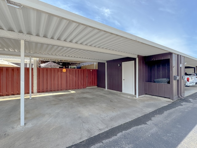 view of vehicle parking featuring a carport