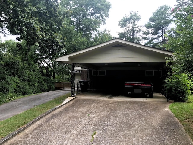 view of front of property featuring a carport