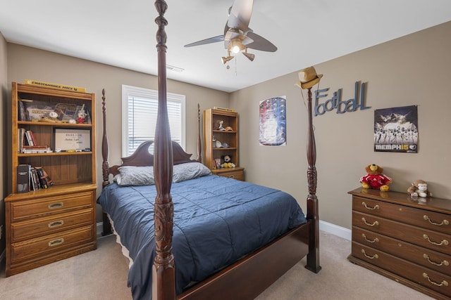 bedroom with light carpet and ceiling fan