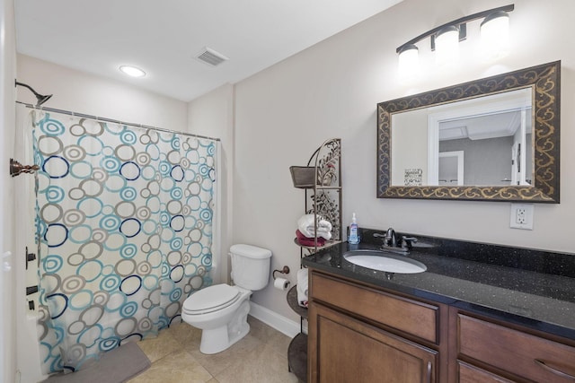 bathroom featuring tile patterned floors, curtained shower, vanity, and toilet