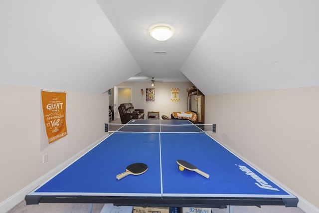 recreation room featuring carpet and lofted ceiling