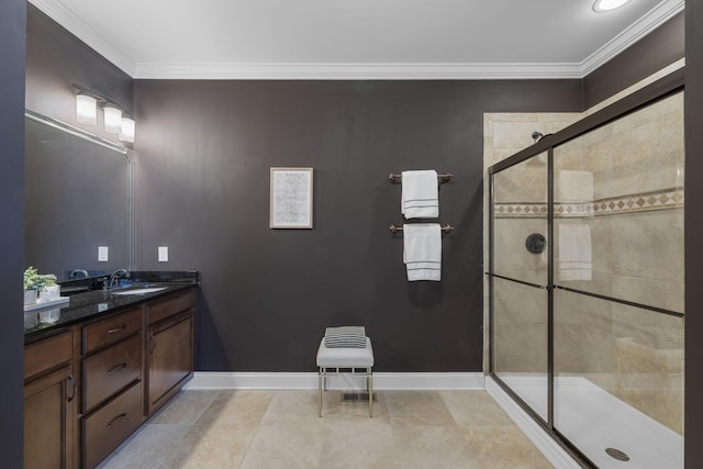 bathroom with tile patterned flooring, a shower with door, and crown molding