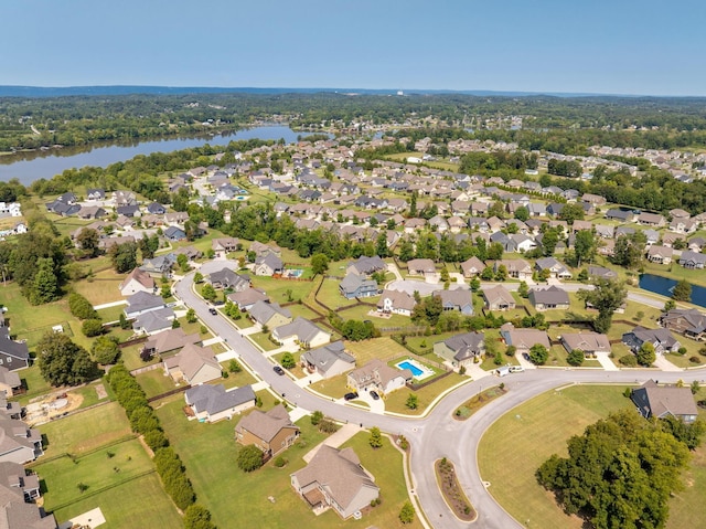 bird's eye view with a water view