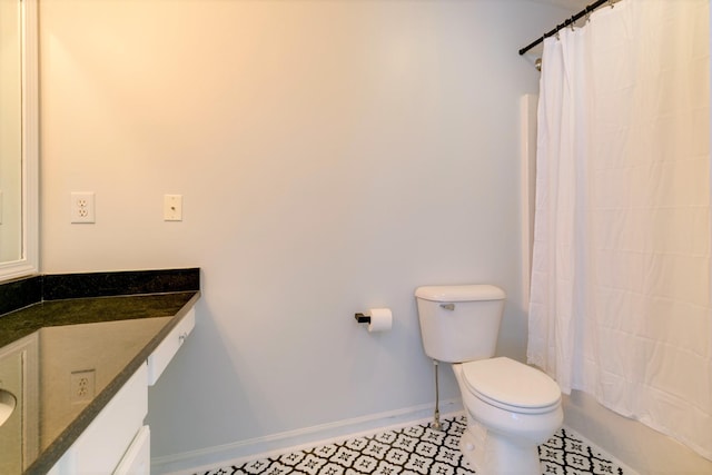 3425 Harpeth Springs Dr, Nashville, TN 37221 - full bath with vanity, toilet, baseboards, and tile patterned floors