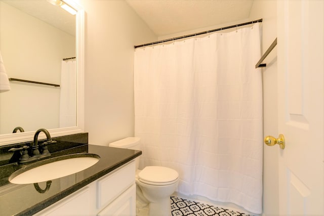 3425 Harpeth Springs Dr, Nashville, TN 37221 - full bathroom with vanity, toilet, and tile patterned floors