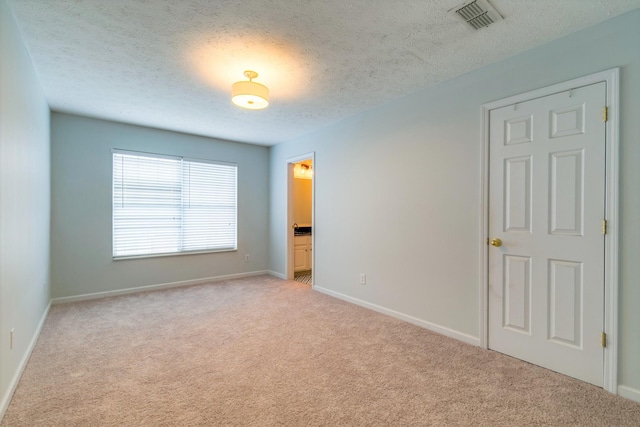 3425 Harpeth Springs Dr, Nashville, TN 37221 - carpeted empty room featuring a textured ceiling and baseboards