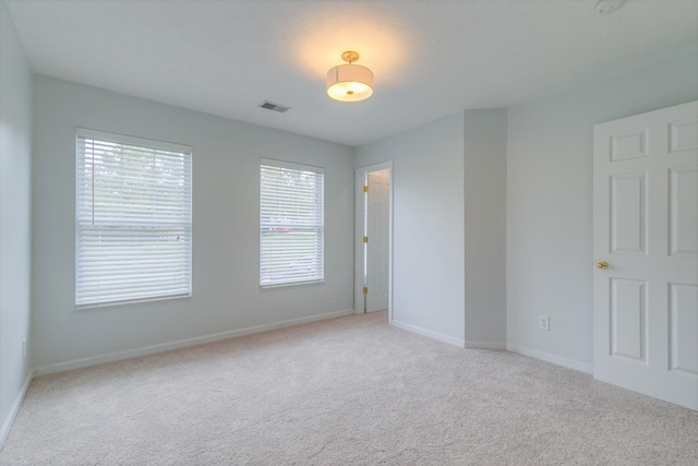 3425 Harpeth Springs Dr, Nashville, TN 37221 - unfurnished bedroom with light colored carpet and baseboards