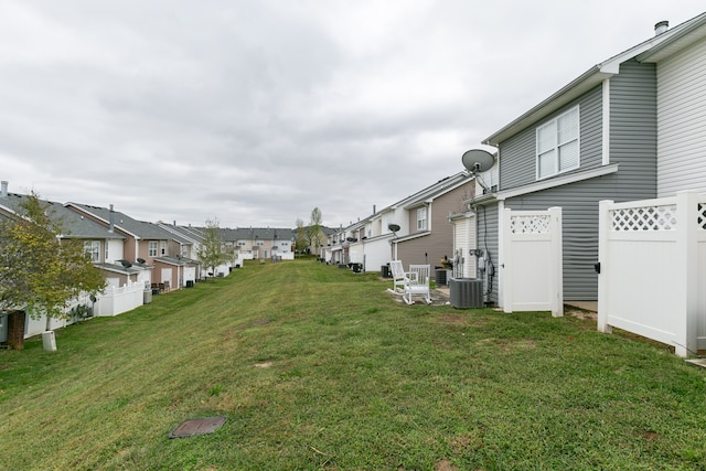 view of yard featuring central AC