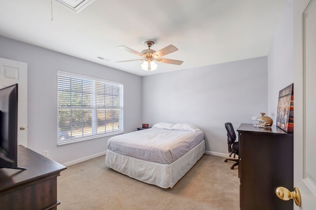 carpeted bedroom featuring ceiling fan