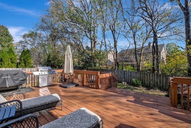 wooden terrace with area for grilling