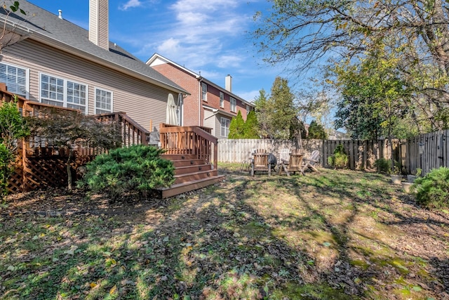 view of yard with a deck