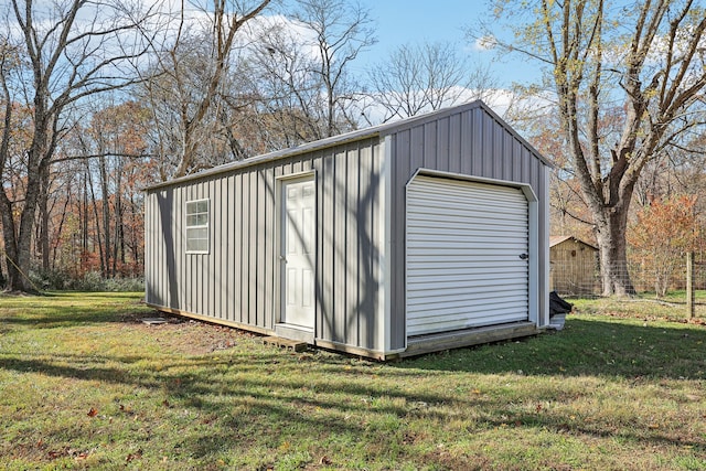 view of outdoor structure with a yard