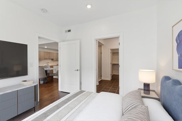 bedroom featuring dark hardwood / wood-style floors