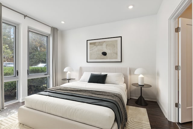 bedroom featuring dark wood-type flooring