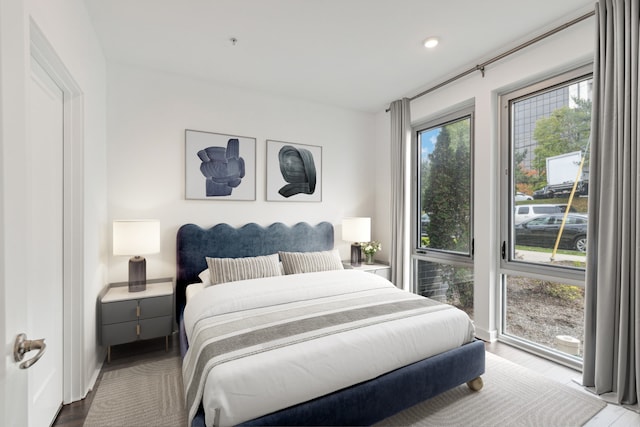 bedroom featuring wood-type flooring