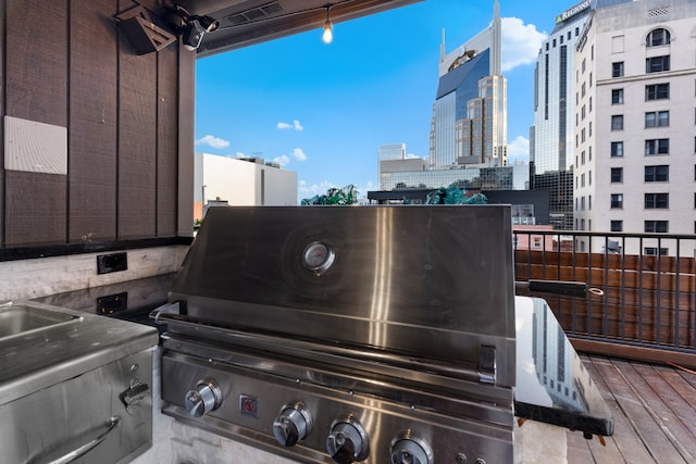 view of patio / terrace with an outdoor kitchen and a grill