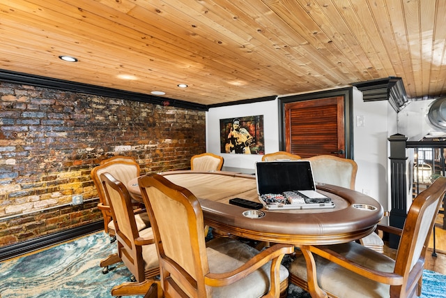 dining space featuring hardwood / wood-style floors, wood ceiling, and brick wall