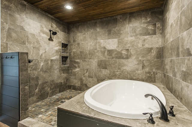 bathroom featuring plus walk in shower and wood ceiling