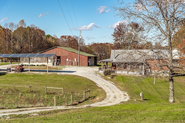 view of yard with an outdoor structure