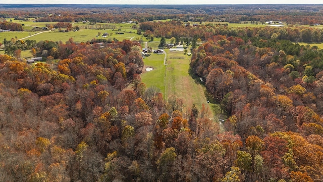 birds eye view of property featuring a rural view