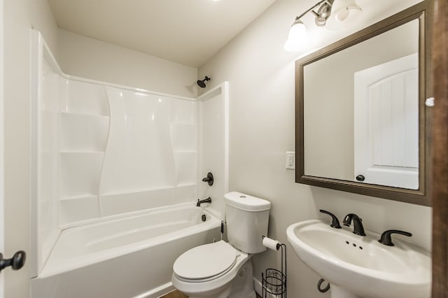 full bathroom featuring  shower combination, toilet, and sink