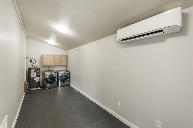 laundry area with independent washer and dryer, cabinets, an AC wall unit, and water heater