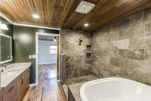 bathroom with plus walk in shower, wood-type flooring, vanity, and wooden ceiling