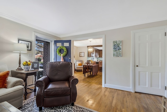 interior space with hardwood / wood-style floors and ornamental molding