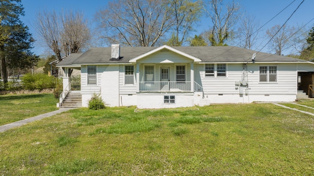 back of house featuring a lawn and a porch